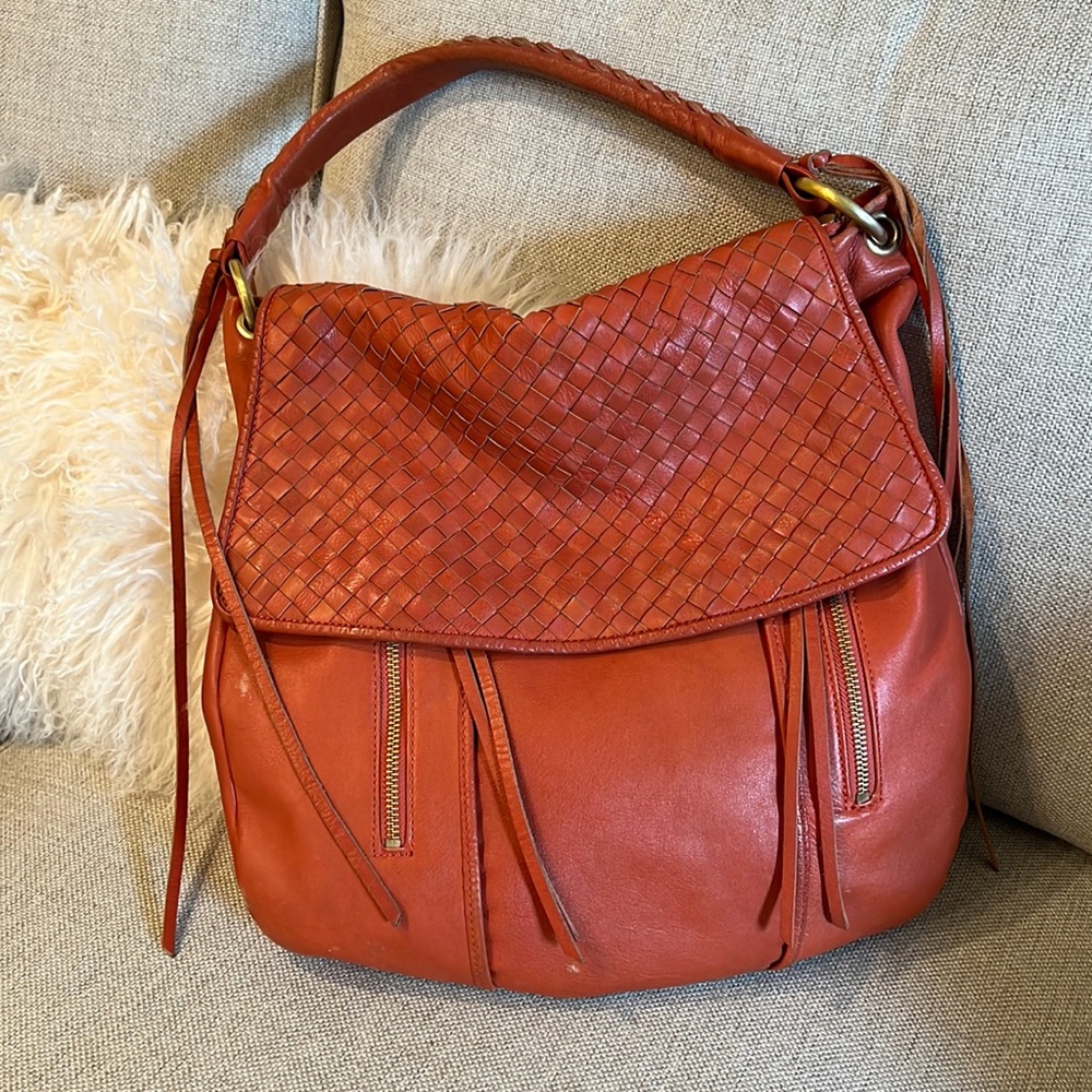Leather shoulder bag with tassels.  Super cute